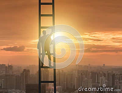 Young businessman climbing career ladder Stock Photo