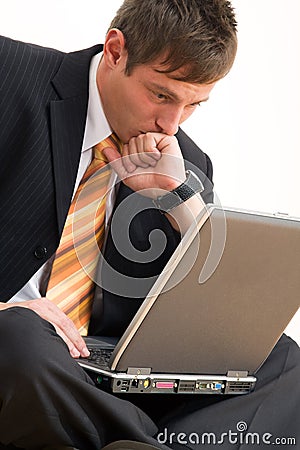 Young businessman with computer Stock Photo