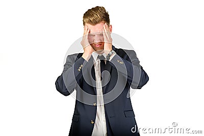 Young businessman in despair clutched his head. Stock Photo