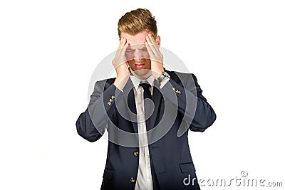 Young businessman in despair clutched his head. Stock Photo