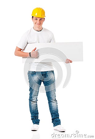 Young businessman in hard hat showing blank Stock Photo