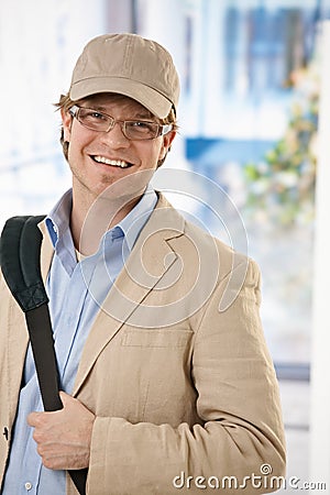 Young businessman leaving office Stock Photo