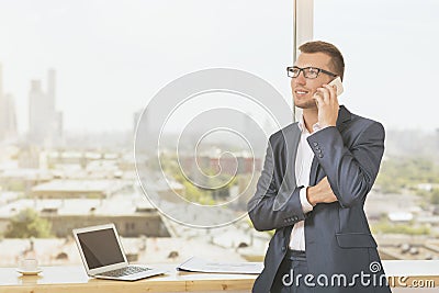 Young businessman on mobile phone Stock Photo