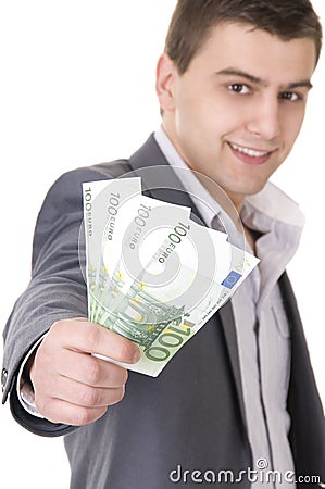 Young Businessman Offering Money Stock Photo