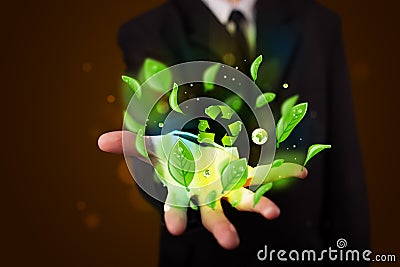 Young businessman presenting eco green leaf recycle energy concept Stock Photo