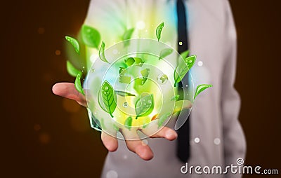 Young businessman presenting eco green leaf recycle energy concept Stock Photo