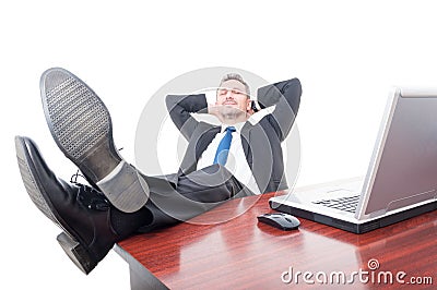 Young businessman relaxing in his office Stock Photo