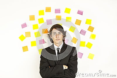 Young businessman with reminder notes Stock Photo