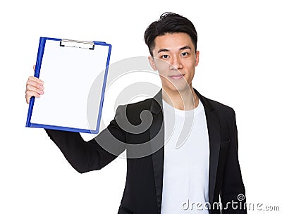 Young businessman show with clipboard and white paper Stock Photo