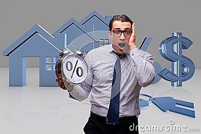 The young businessman surprised at high interest mortgage rates Stock Photo