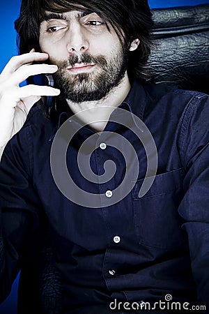 Young Businessman On Telephone Stock Photo