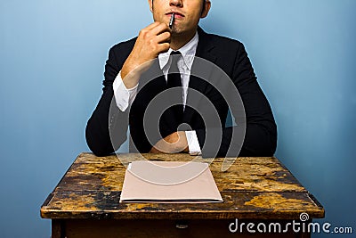 Young businessman thinking Stock Photo