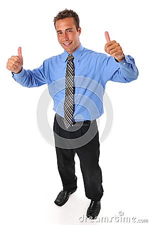 Young businessman with thums up gesture Stock Photo