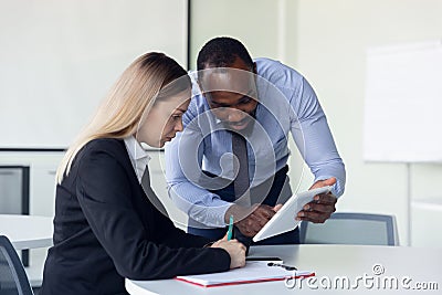 Young businessman waiting for departure in airport, work trip, business lifestyle Stock Photo