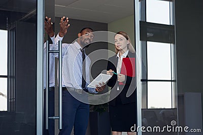 Young businessman waiting for departure in airport, work trip, business lifestyle Stock Photo