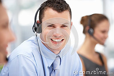 Young businessman wearing headset Stock Photo