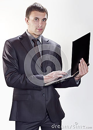Young Businessman working on laptop Stock Photo