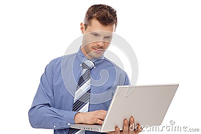 Young businessman working on laptop Stock Photo