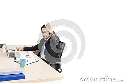 Young businessman working with laptop and office Supplies. Stock Photo