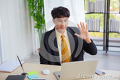 Young businessmen are greeting business partners Stock Photo
