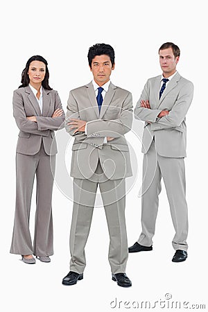 Young businessteam with folded arms Stock Photo