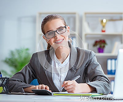 Young businesswoman accountant working in the office Stock Photo