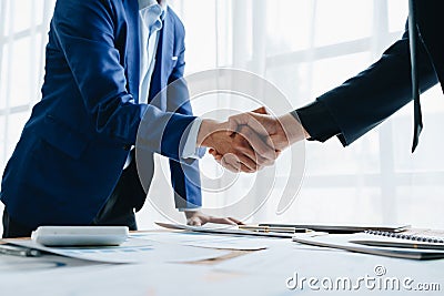 Young businesswoman collaborate with partners to increase their business investment network for Plans to improve quality Stock Photo