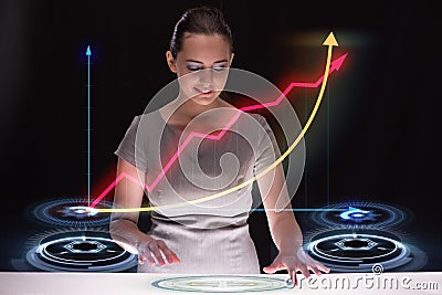 The young businesswoman with chart diagrams Stock Photo