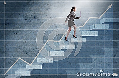 The young businesswoman climbing career ladder Stock Photo