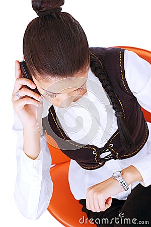 Young businesswoman looking on her watch Stock Photo