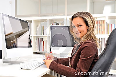 Young businesswoman at the office Stock Photo