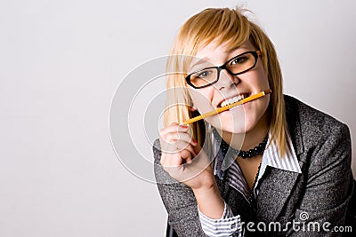 Young businesswoman with pencil Stock Photo