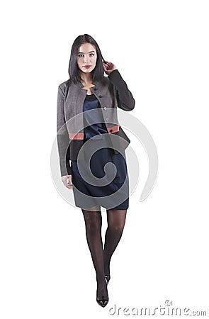 Young businesswoman serious formal brunette occupation isolated pretty standing Stock Photo