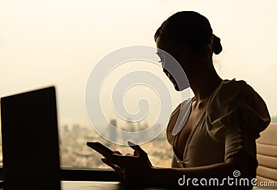 A young businesswoman who travels all over the world to do business. must stay and live in a hotel as a place to relax Stock Photo