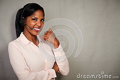 Young callcenter operator smiling at the camera Stock Photo