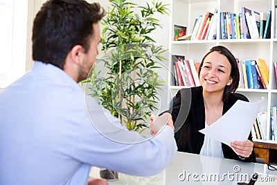 Handshake after successful job interview and cv Stock Photo