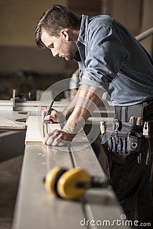 Young carpenter at work Stock Photo