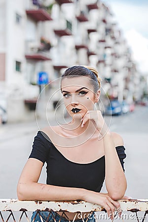 Young caucasian female with bright dark makeup Stock Photo