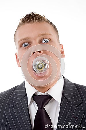 Young caucasian holding electric bulb in his mouth Stock Photo