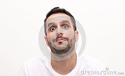 Caucasian young adult man looks surprised Stock Photo