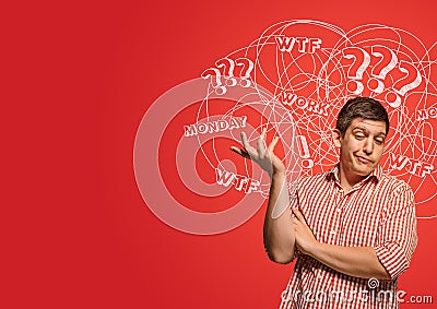 Young caucasian man with mixed thoughts Stock Photo