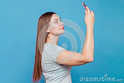 Attractive young woman makes selfie Stock Photo