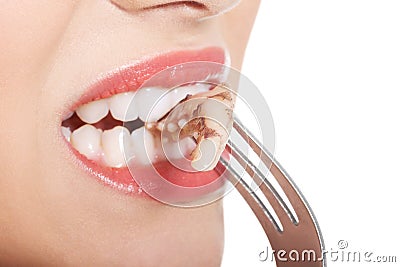 Young caucasian woman eating seafood with disguise. Stock Photo