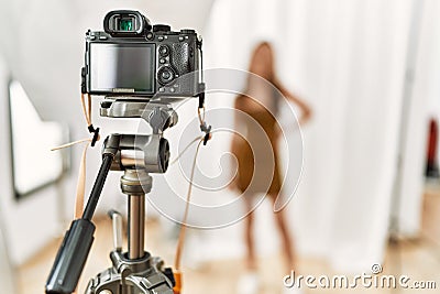 Young caucasian woman model having photo shooting photo studio Stock Photo