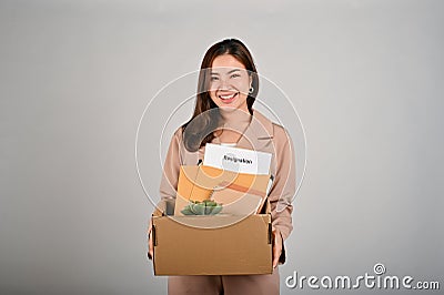 Young cheerful businesswoman celebrating after quitting her job Stock Photo