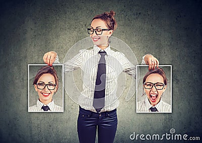 Cheerful woman showing different photos with emotions Stock Photo