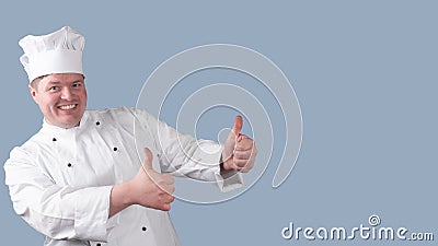 Chef holds his thumb up Stock Photo