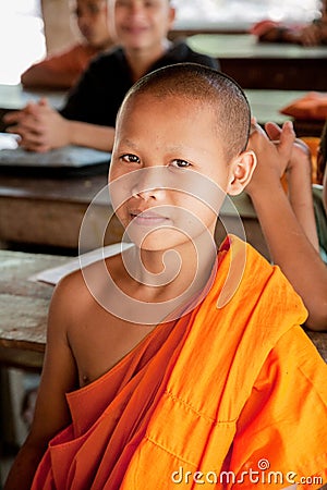 Young child studing to be a Buddhist Monks in Cambodi Editorial Stock Photo