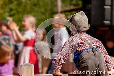 Young child in typical costume during an autumn local celebration in Val di Funes South Tyrol Editorial Stock Photo