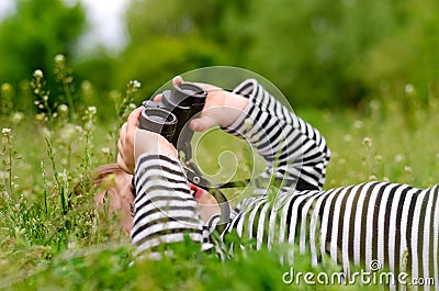 Young child using a pair of binoculars Stock Photo